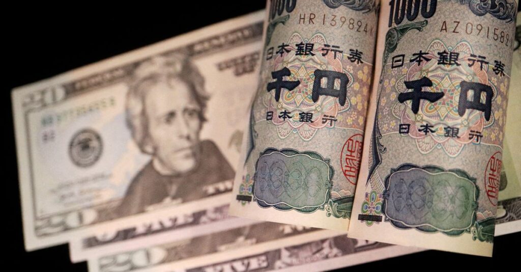 FILE PHOTO: Illustration picture of Japanese yen and U.S. dollar banknotes