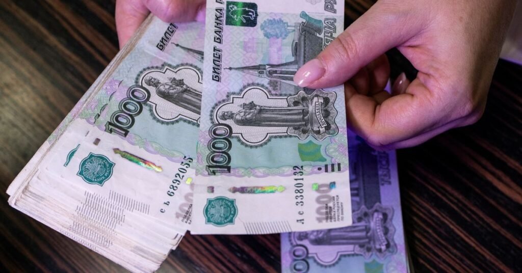 Illustration shows Russian rouble banknotes