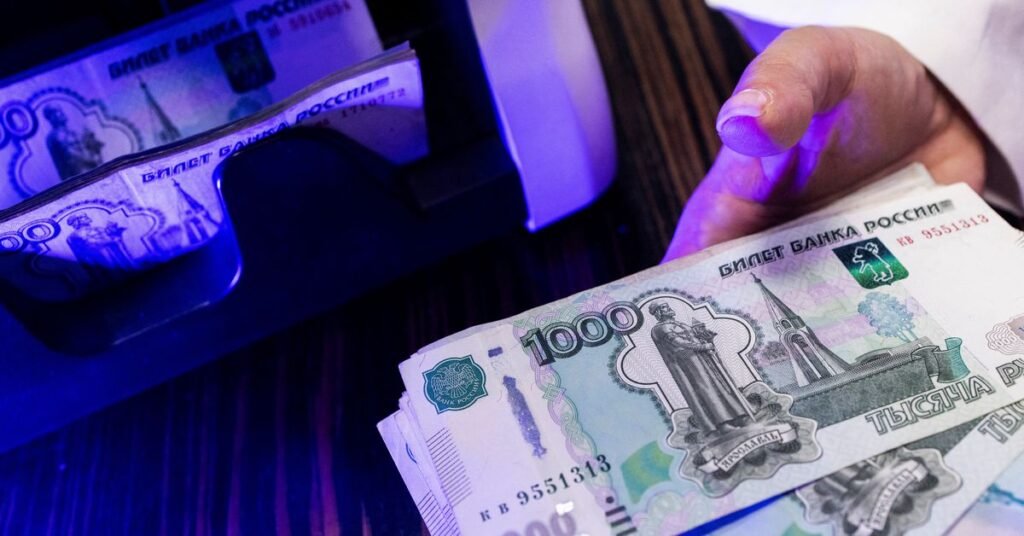 Illustration shows Russian rouble banknotes