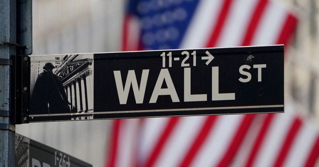The Wall Street sign is pictured at the New York Stock exchange (NYSE) in New York City, United States
