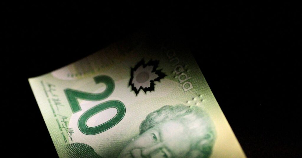 الدولار الكندي يسجل انخفاضا أسبوعيا قبيل قرار بنك كندا بشأن سعر الفائدة Illustration photo of a Canada Dollar note