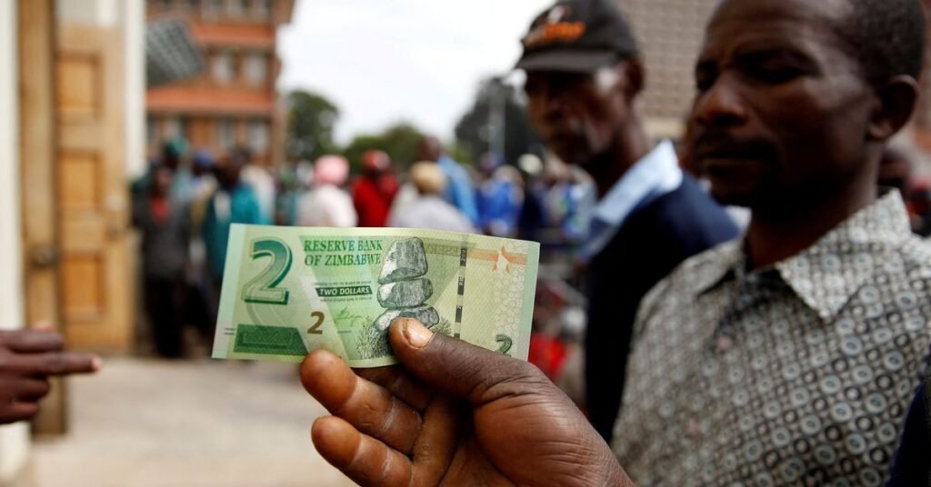 A man poses with Zimbabwe