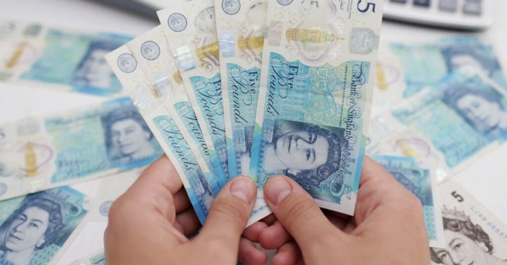 Illustration shows British Pound banknotes