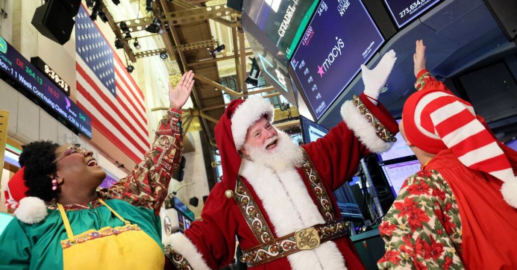 Traders work on the floor of the NYSE in New York