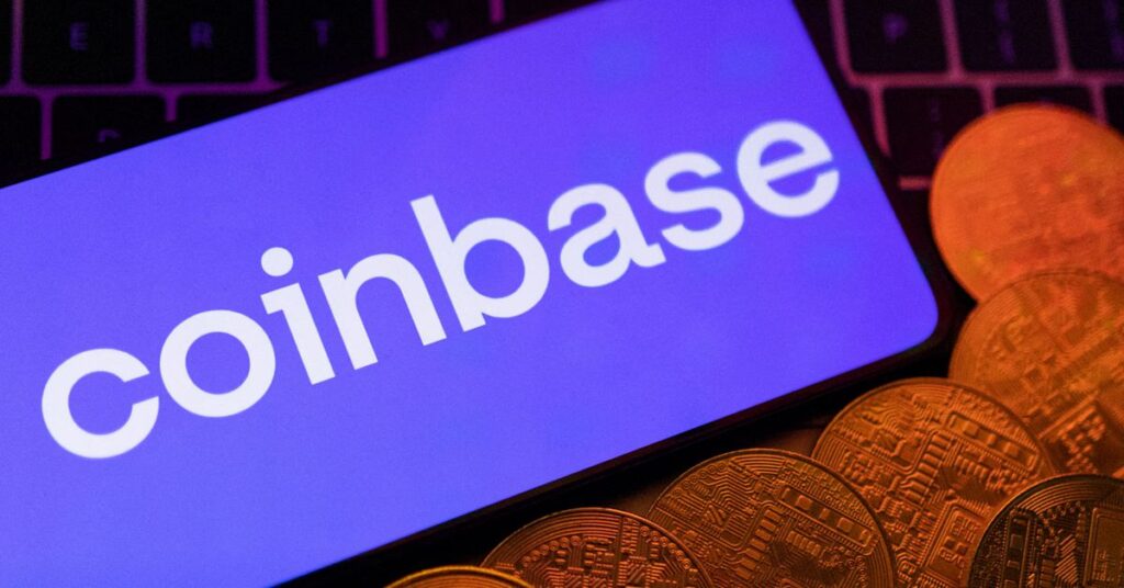 Illustration shows smartphone with displayed Coinbase logo