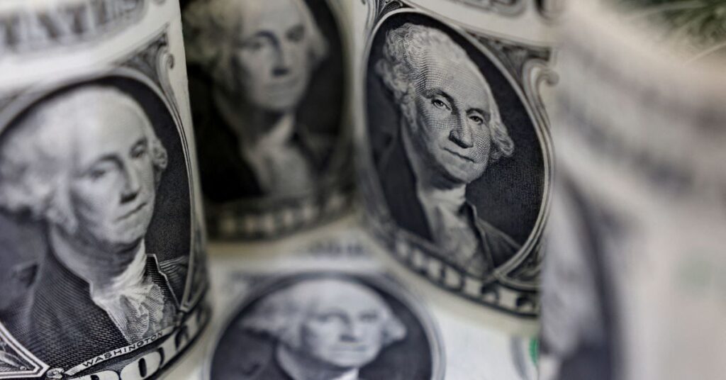 Illustration shows U.S. Dollar banknotes