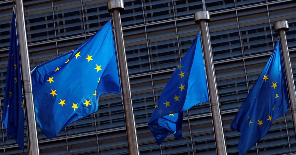 EU flags are seen outside the EU Commission headquarters in Brussels